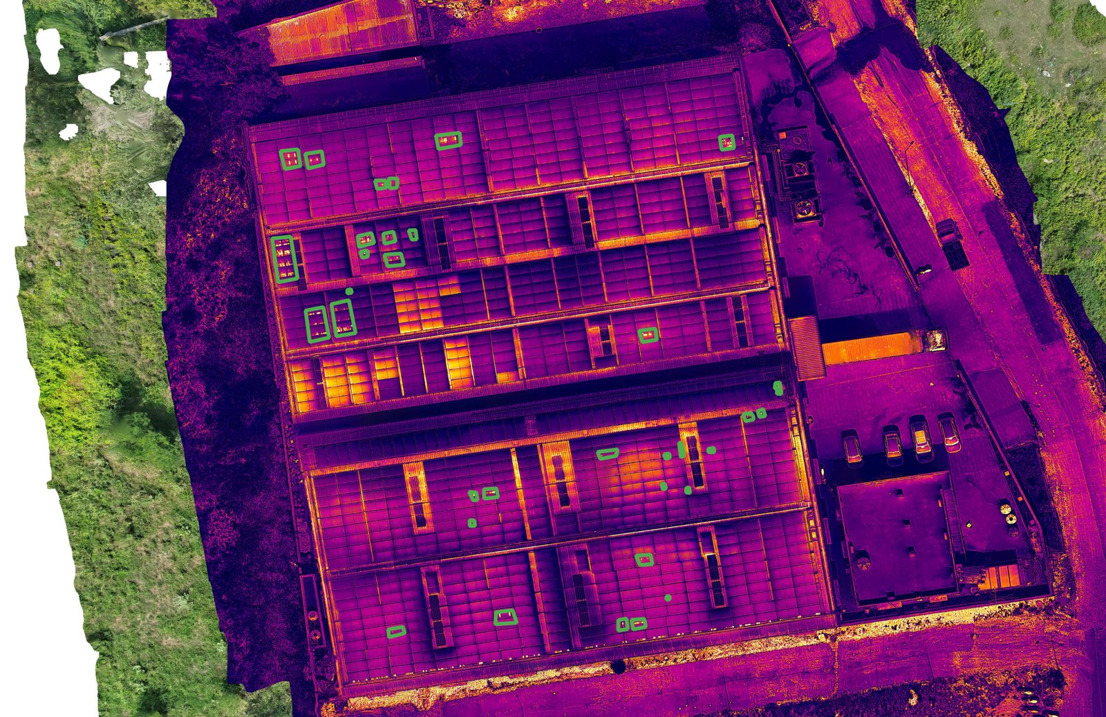 Drone thermal map of the same rooftop solar array, with warmer surfaces shown in yellow and orange.
